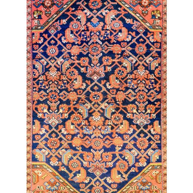 A beautiful early 20th century Persian Hamadan rug with beautiful large diamond medallion with an all-over multi-colored...