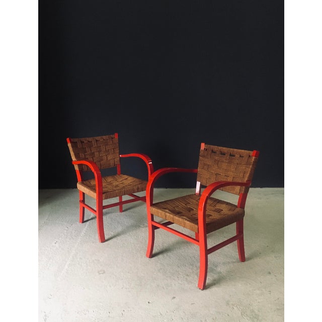 Vintage Mediterranean Design Arm Chair Set 1. Made in France, 1950's period. Red lacquered beech frame with woven rope...