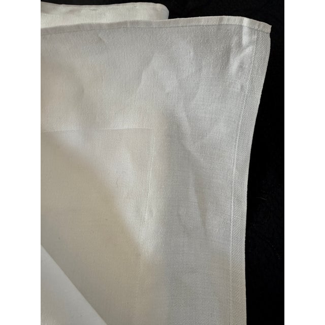 Vintage Monogram French Linen flat sheet or tablecloth—featuring an ornate white embroidered monogram with the letters...