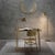 This elegant floor lamp is shaped entirely of brass and features a round base supporting a stand with two-elements, the...