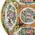 Vintage Chinese Famille Rose Canton decorative plate featuring a lush, intricate composition of hand-painted enamels over...