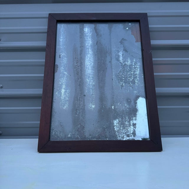 **Exceptional 19th Century Antique Mirror with Natural Mercury Glass Foxing** This remarkable piece represents a...