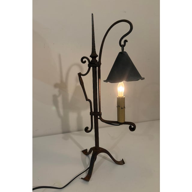 Exceptional antique hand-forged wrought iron table lamp dating to approximately 1925–1945. From a Pennsylvania family...