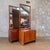 Pair of vintage Mid-Century Modern nightstands crafted in warm walnut with sleek chrome accents. Each features double-door...