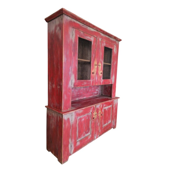 A large two-part kitchen buffet, France, circa 1980. Solid wood, in two sections. The upper case has a moulded cornice and...