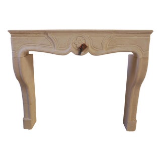 20th Century French Louis XV Limestone Fireplace with Floral Medallion For Sale