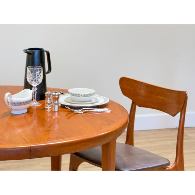 A distinguished example of Mid-century Danish design, this extending dining table by VV Møbler carries with it both quiet...