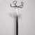 This is a vintage chromed metal coat rack from the 1970s, featuring a distinctive vertical tubular structure and a...