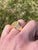 The Hilario: Gentlemen's Natural Diamond Signet Ring in Yellow Gold. This distinguished ring features a cushion-shaped...