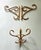 Offered is a set of 3 vintage bamboo rattan wall-mounted coat and hat racks (resembling Italian or French designer pieces...