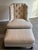 Elegant Baker Furniture lounge chair with matching ottoman featuring a dramatic tufted wingback silhouette and luxurious...