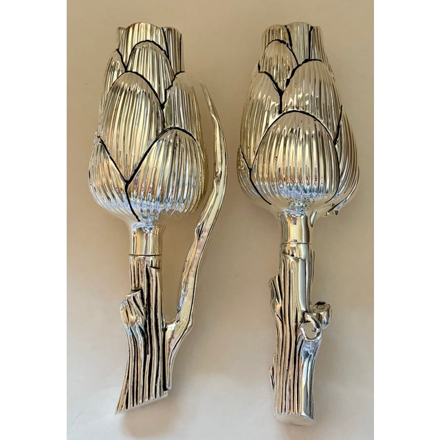 After Missiaglia, this Italian silver plate salt shaker and pepper mill set is in the form of artichokes. Each piece is...