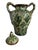 Mid 20th century lidded urn with handles, featuring a richly detailed majolica grapevine motif. The glazed surface carries...