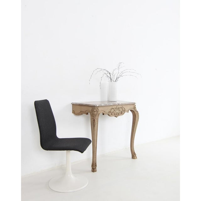 An elegant small wall table or console table in the Louis XV style. Early 20th century. Oak with a marble top. Wall...