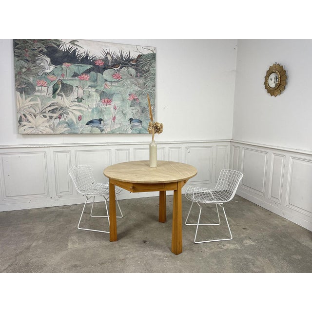 Ultra-stylish, this small tripod dining table was crafted from beech wood (raw for the top, varnished for the frame) in...