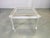 Italian modernist coffee table produced in the 1980s. The table features a sculptural clear acrylic frame with rounded...