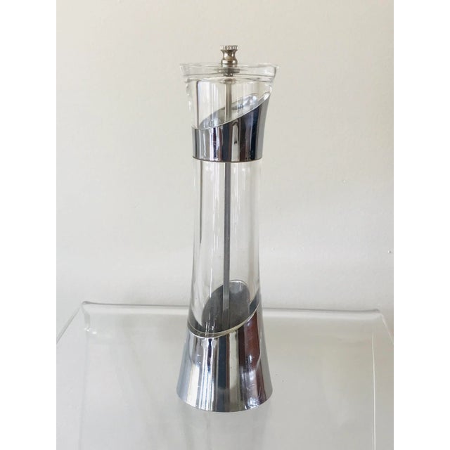 A lucite and chrome toned pepper mill by Olde Thompson from the 70s.