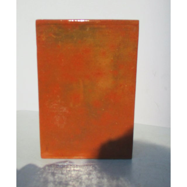 Chinese pillow vase glazed in red sienna glaze over all surfaces inside and bottom. Impressed CHINA to the base. Slab...