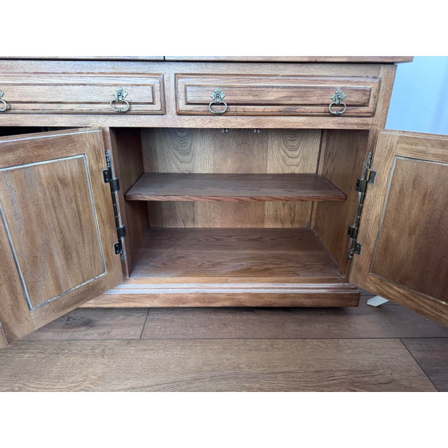 This piece was one I inherited from my grandparents whom had many higher end furniture and art etc. This was on a landing...