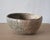An organically formed American studio pottery bowl made in New York, with an intentionally irregular rim and a nuanced,...