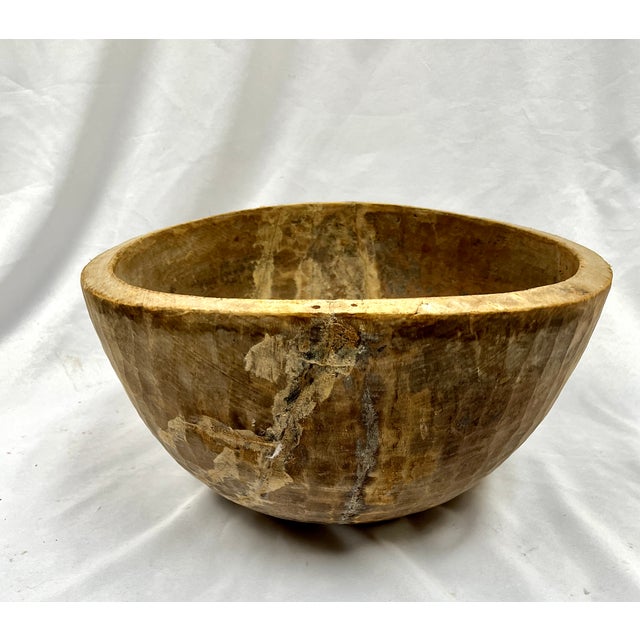 Natural wood hand carved to capture the organic charm in this aged bowl. Variations throughout the piece give interest and...