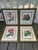 Vibrant and richly colored set of four antique chromolithographs in shades of red, pink and green. These were done circa...