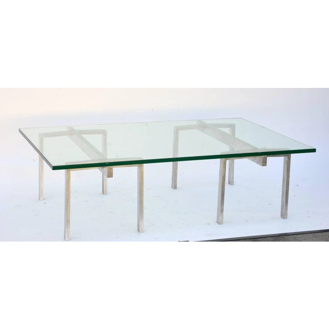 3/4 in. thick tempered glass top over polished stainless steel bases. The glass top can be ordered in a larger size...