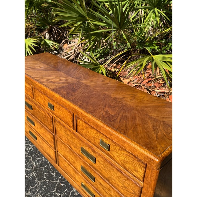 A beautifully crafted vintage Mid-Century Modern lowboy dresser by Stanley Furniture, featuring clean architectural lines,...