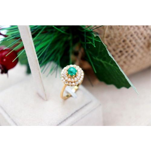 Gold ring in the shape of a shower with diamonds (36) in 8/8 brilliant cut and emerald in the shape of a cabochon. Metal:...