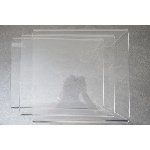 Panton Era Acrylic Glass Side Tables, Set of 3, from the 1970s. The table set is versatile and in very good condition,...