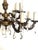 Antique French Brass and Lead Crystal 12-Light Chandelier, 1920s, in Very Good conditions. Designed 1920 to 1949 I have...