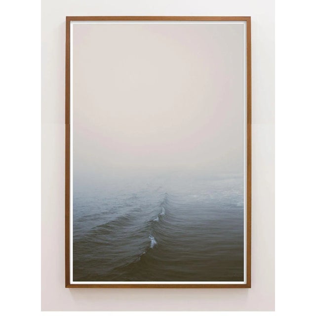 This photograph of a rippling wave in the pacific ocean is calm and majestic. The minimalist image offers a touch of Zen...