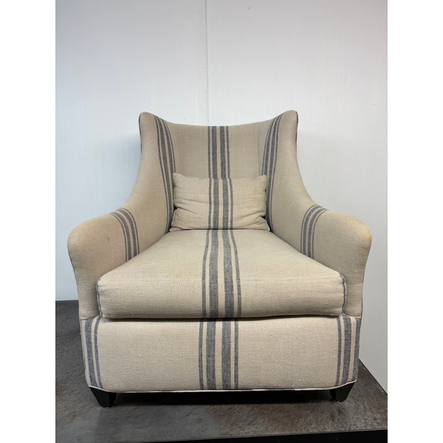 Design Plus Gallery presents the Lloyd Arm Chair from Cisco Brothers. The chair has a gentle silhouette and is draped in a...