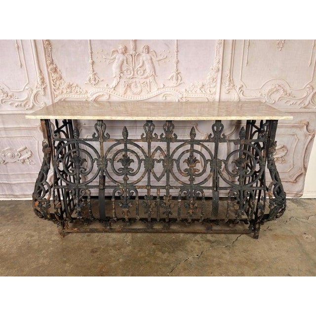 A magnificent antique French architectural console, born from a salvaged 19th-century Parisian balcony and elevated into...