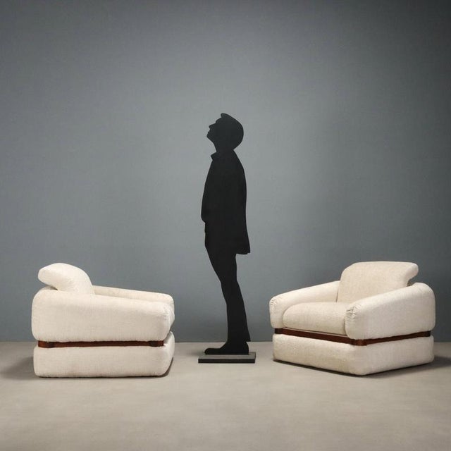 Vintage armchairs from the 1970s, featuring a welcoming design and exceptional comfort. The foam padding has been...