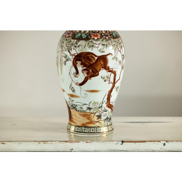 Porcelain Baluster Shaped Vase with Hand-Painted Monkeys and Floral Motifs For Sale - Image 10 of 12