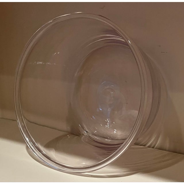 Antique 19th century American clear/colorless blown glass bowl with rolled lip and polished pontil. Measures 8 1/2"...