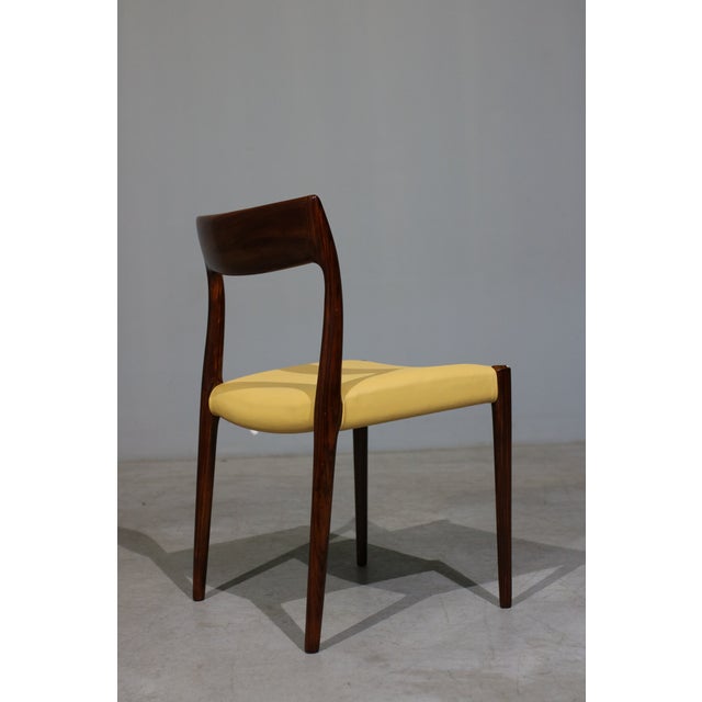 This set of six Model 77 dining chairs by Niels O. Møller for J.L. Møllers represents a timeless icon of Danish mid...