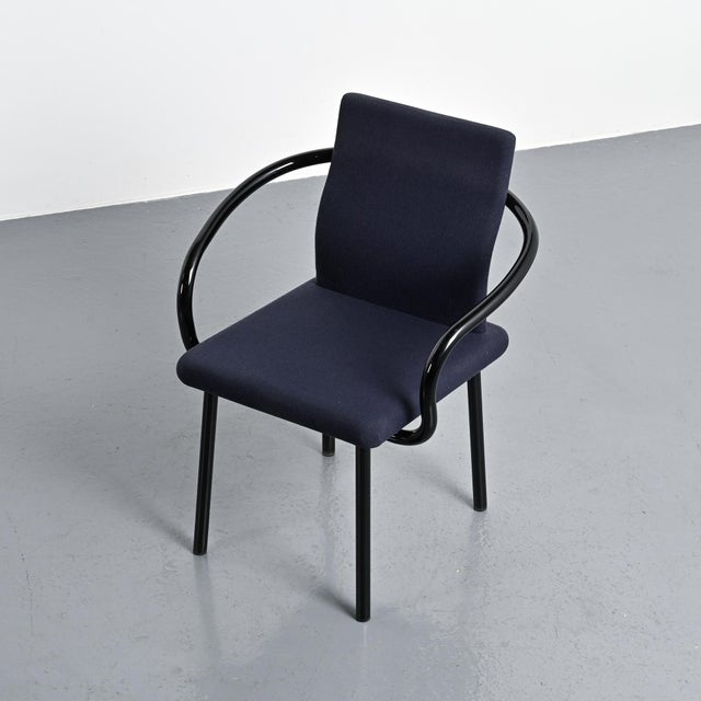 The Mandarin chair, designed by Ettore Sottsass for Knoll International in 1986, is representative of the postmodern...