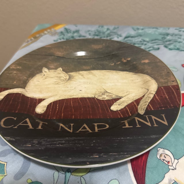 Bring classic American charm to your tabletop or wall display with this pair of vintage stoneware plates featuring the...