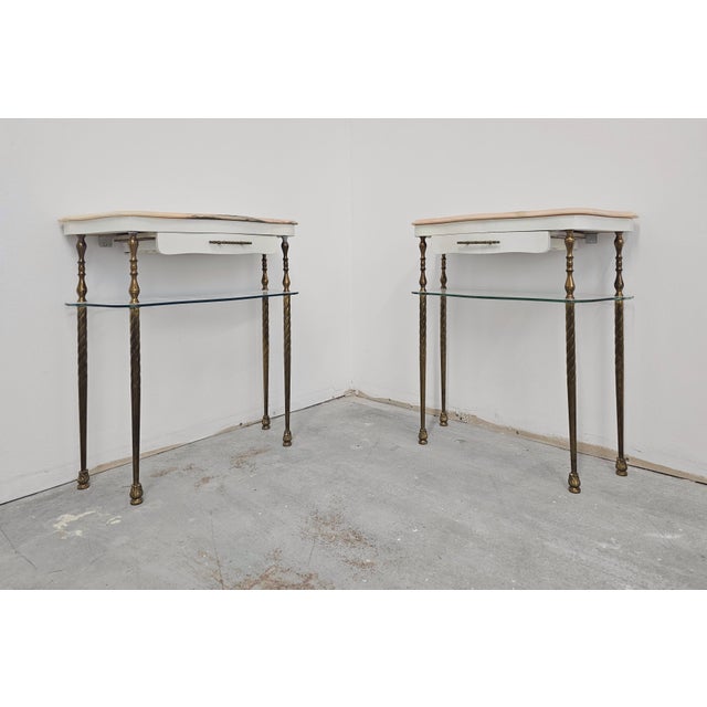 In this listing you will find a pair of stunning and very elegant Hollywood Regency Nightstands. They are made in bronze,...