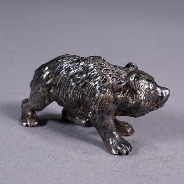 Cast of a Strolling Bear Sterling Silver ca. 1930s A lovely sculpture of a strolling bear casted in sterling silver,...