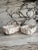 Pair of vintage white handcrafted in Italy ceramic decorative bread fruit baskets. Marked on underside.