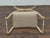 With its sweeping curule base and refined ornamentation, this French Neoclassical-style stool echoes the grandeur of...