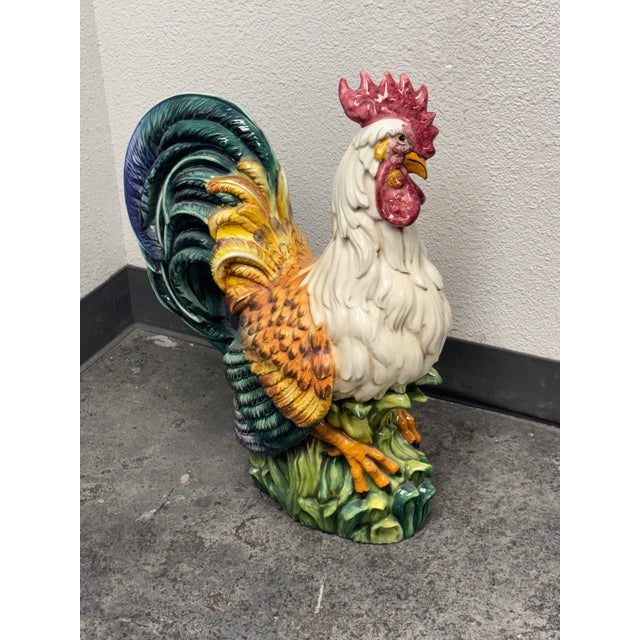 Design Plus Gallery presents a Large Glazed Ceramic Rooster Sculpture. This colorful ceramic rooster showcases a glossy...