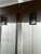 This is a Vintage Chrome and Veneer Etagere by Sunrise Design. It is a mid-century modern chrome and faux-wood etagere...