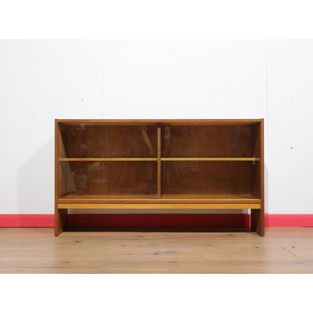 A beautiful Danish inspired bookcase display cabinet, this Mid Century Modern Vintage Teak piece exemplifies minimalist...