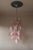 DUTIES FREE A striking contemporary chandelier handcrafted in Murano, Italy, featuring an elegant composition of hand-...