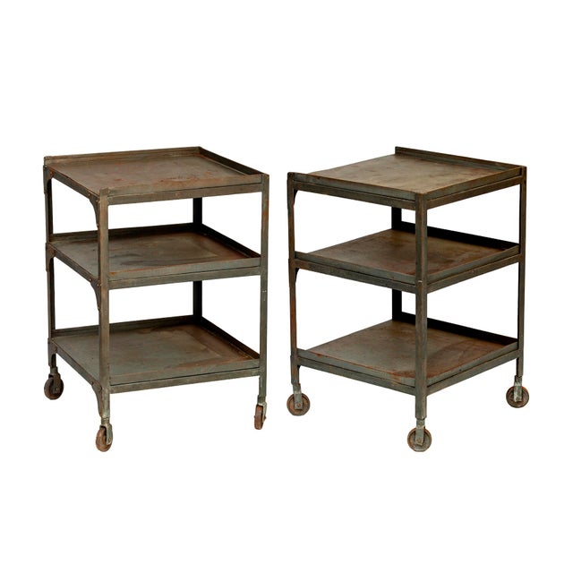 Pair of MCM Industrial Rolling Side Tables with 2 shelves below plus the top equals 3 slelves total. with wheels. Metal...