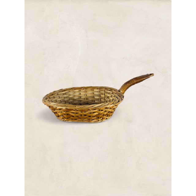 Vintage English Skillet-Shaped Bread Basket Woven into the shape of a cast iron skillet, complete with a handle, this...